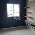 Seu Refúgio Acolhedor: Apartamento Térreo de 2 Dormitórios no Bairro Santos Dumont