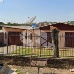 Casa com 110m², 3 dormitórios, 2 vagas de garagem no bairro Cinquentenário