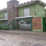 Casa/sobrado com 2 aptos, térreo 2 dormitórios superior 3 dormitórios no bairro Sarandi