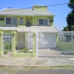 Casa 3 dormitórios, 1 suíte e 4 vagas de garagem no bairro Jardim Itu Sabará em Porto Alegre/RS