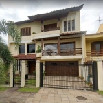 Casa à venda com 4 suítes,  4 vagas de garagem,  no bairro Jardim Planalto - Porto Alegre/RS