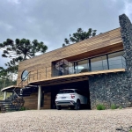 Casa com vista panorâmica MOBILIADA com 4 dormitórios, sendo 4 suítes, 2 vagas de garagem em URUBICI /SC.