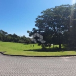 Terreno plano de esquina com área de 2600 m², em Cacupé - Florianópolis/SC.