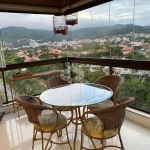 Apartamento semimobiliado com vista panorâmica, 3 dormitórios, sendo 1 suíte, 2 vagas -  Itacorubi, Fpolis SC