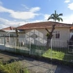 CASA COM 3 QUARTOS SENDO 1 SUÍTE E 5 VAGAS DE GARAGEM NO BAIRRO JARDIM ELDORADO EM PALHOÇA/SC