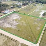 Terreno com área de 12.878,12 m², escriturado e averbado no RI.