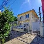 Sobrado com pátio composto de 2 apartamentos independentes de 3 quartos e casa nos fundos com  2 quartos no bairro Passo D?areia junto ao Carrefour