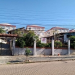 Terreno à venda, com casas e estacionamento,  Rubem Berta.