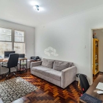 Apartamento 3 dormitórios, semimobiliado, sacada e churrasqueira no bairro São Geraldo, em Porto Alegre. Aceita financiamento e FGTS..