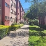 Apartamento 3 dormitórios, 1 banheiro, sala, cozinha com armários, vaga de garagem.