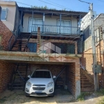 Casa à venda com 3 quartos/dormitórios, 2 vagas no bairro Santo Antônio em Porto Alegre.