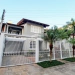 Casa à venda com 4 dormitórios e 325 m² no bairro Jardim Lindóia em Porto Alegre