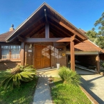 Casa estilo rústica em Linha Santa Cruz, 03 dormitórios e piscina