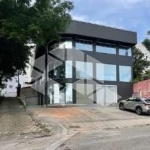 PRÉDIO COMERCIAL NO BAIRRO ESTREITO, EM FLORIANÓPOLIS, SC, VISTA PARA O MAR, MEDINDO 1,100M² DE ÁREA TOTAL, 03 PAVIMENTOS, E 10 VAGAS DE GARAGEM