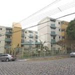 VENDO: Apartamento amplo com  dois quartos, e um box  de garagem no Pio X.