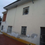 Casa de 4 dormitórios com edícula