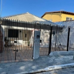 Oportunidade    para   renda    terreno   com   3 casas   todas   alugada