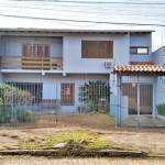 Casa com 3 quartos à venda na Rua Vítor Valpírio, 489, Anchieta, Porto Alegre