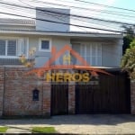 Casa com 6 quartos à venda na Rua Arapei, 228, Cristal, Porto Alegre