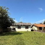 Casa com amplo terreno de 390m² (13x30) á 400 metros da praia no Balneário Volta ao Mundo em  Itapoá SC