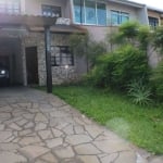 Sobrado com 3 dormitórios à venda, 243 m² por R$ 980.000,00 - Jardim das Américas - Curitiba/PR