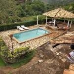 Excelente granja com casa de 5 quartos, piscina, luz da Cemig, várias garagens, e terreno de 3.600m², no Ribeirão do Carmo.