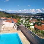 Linda casa com quatro dormitórios dois suítes e área gourmet com piscina no Jardim Silmara em Amparo