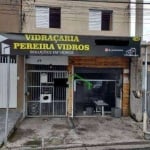 Excelente Terreno com 4 Casas, Salão Comercial e Garagem para Renda - Ótima Localização!