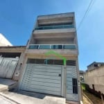 Sobrado com duas casas e salão comercial à venda