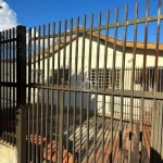 Casa com 3 dormitório com dependência  à venda, 120 m² por R$