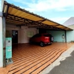 Linda casa em condominio, com garagem coberta para 03 carros