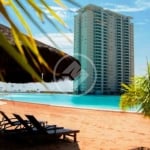 Apartamento condominio Brasil Beach de 88m2 com dois quartos sendo uma suíte, sacada com chiurrasqueira, banheiro social, lavabo, móveis planejados, duas vagas de garagem, depósito, área de lazer comp