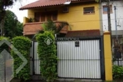 Casa em condomínio fechado com 3 quartos à venda na Rua Mura, 120, Guarujá, Porto Alegre