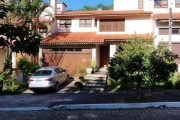 Casa em condomínio fechado com 4 quartos à venda na Rua Fernando Osório, 90, Teresópolis, Porto Alegre