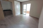 Apartamento com 2 dormitórios à venda, 61 m² por R$ 450.000,00 - Vila Guilhermina - Praia Grande/SP