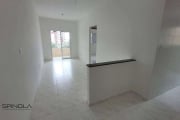 Apartamento com 2 dormitórios à venda, 52 m² por R$ 375.000,00 - Caiçara - Praia Grande/SP