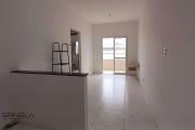 Apartamento com 2 dormitórios à venda, 53 m² por R$ 349.000,00 - Caiçara - Praia Grande/SP