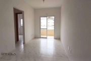 Apartamento com 2 dormitórios à venda, 53 m² por R$ 340.000,00 - Caiçara - Praia Grande/SP