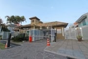 Casa de condomínio 4 dormitórios à venda no Bairro Sarandi com 243 m² de área privativa - 2 vagas de garagem