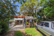 Casa com 5 quartos à venda na Avenida Vicente Monteggia, 2231, Cavalhada, Porto Alegre