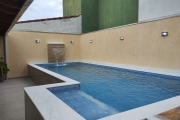 Casa nova com piscina , lote inteiro a venda em Itanhaém/SP.