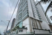 Apartamento com 3 suítes em frente a praia do caiçara com sacada gourmet vista mar definitiva.