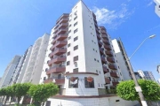 VENDA DE APARTAMENTO NA PRAIA GRANDE/SP, 80m² com quarto, suíte, sala com varanda, piscina, churrasqueira, 1 vaga e a 2 quadras da praia. CONSULTE-NOS