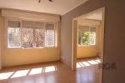 Excelente apartamento à venda no bairro Menino Deus, em Porto Alegre. &lt;BR&gt;Com 3 dormitórios (transformado em 2), sendo 1 suíte, 2 banheiros sociais, 2 salas, área de serviços com uma ótima e esp