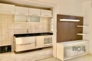 Apartamento 2 Dormitórios  56,20 m² ,  semi mobiliado, living dois ambientes, piso laminado,banheiro social com  box  de vidro  temperado, ventilação natural, cozinha americana, área de serviço com ve