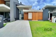 Descubra a casa dos seus sonhos à venda no prestigiado Condomínio Sunset, em Xangri-Lá, RS!&lt;BR&gt; Casa terrea com 4 quartos, todos suítes, esta residência é ideal para você e sua família desfrutar