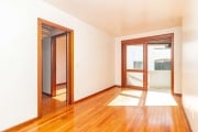 Apartamento dois dormitórios com suite, vaga e elevador