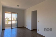 Apartamento de 60m², 2 dormitórios, sacada com churrasqueira, living com dois ambientes, cozinha ampla, área de serviço separada, um banheiro social e uma vaga de garagem. Vista linda para a cidade e 