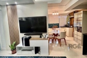 Vende-se apartamento semi mobiliado, no Bairro Cristo Redentor, com vista definida, 3 dormitórios com suíte, 2 vagas, living amplo com cozinha americana integrada com churrasqueira, área de serviço se