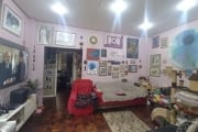 Vende apartamento térreo com 84m² úteis, living dois ambientes, 4 dormitórios transformado em 3 sendo um suíte, piso parquet, pátio.&lt;BR&gt;&lt;BR&gt;Condomínio oferece: Portaria 24 horas, elevadore